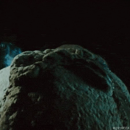 An egg pod opening from the movie Alien