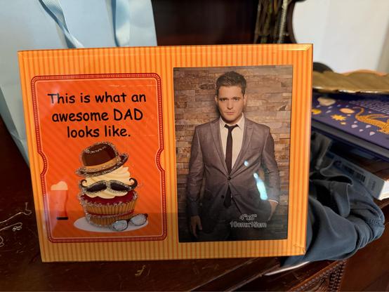 Photo frame that says This is What an awesome Dad looks like next to a picture of Michael Buble.