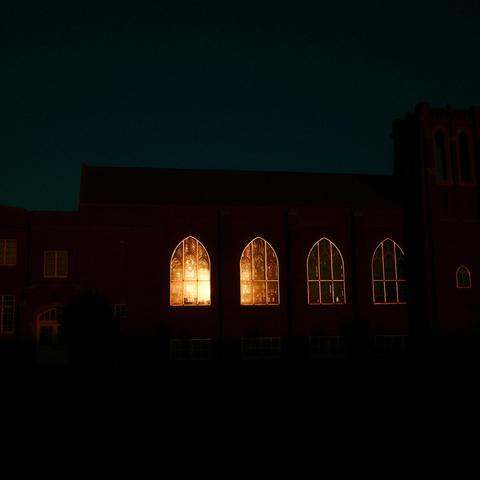Sunlight reflecting off church windows.